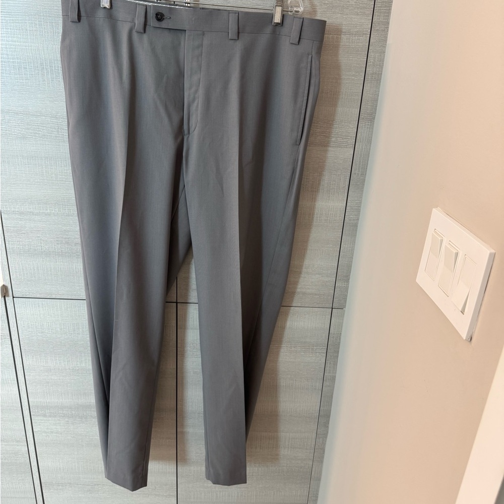 Calvin Klein Men’s grey dress pants. Size 38 W x 32 L. Washable.